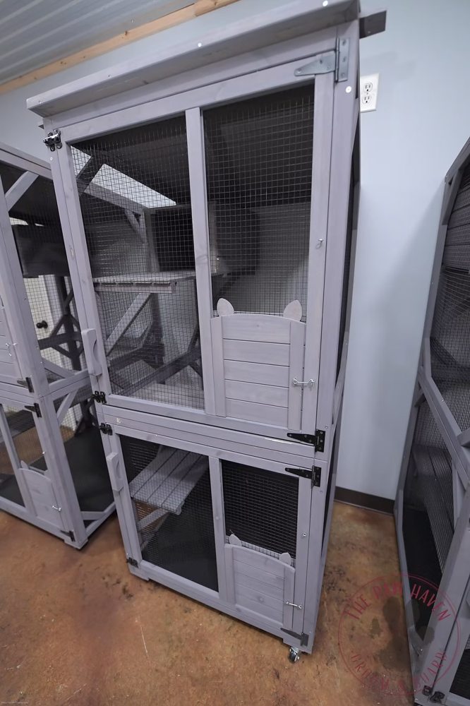 Close-up of a Cat Condo showing multiple levels, ramps, and the hideaway den